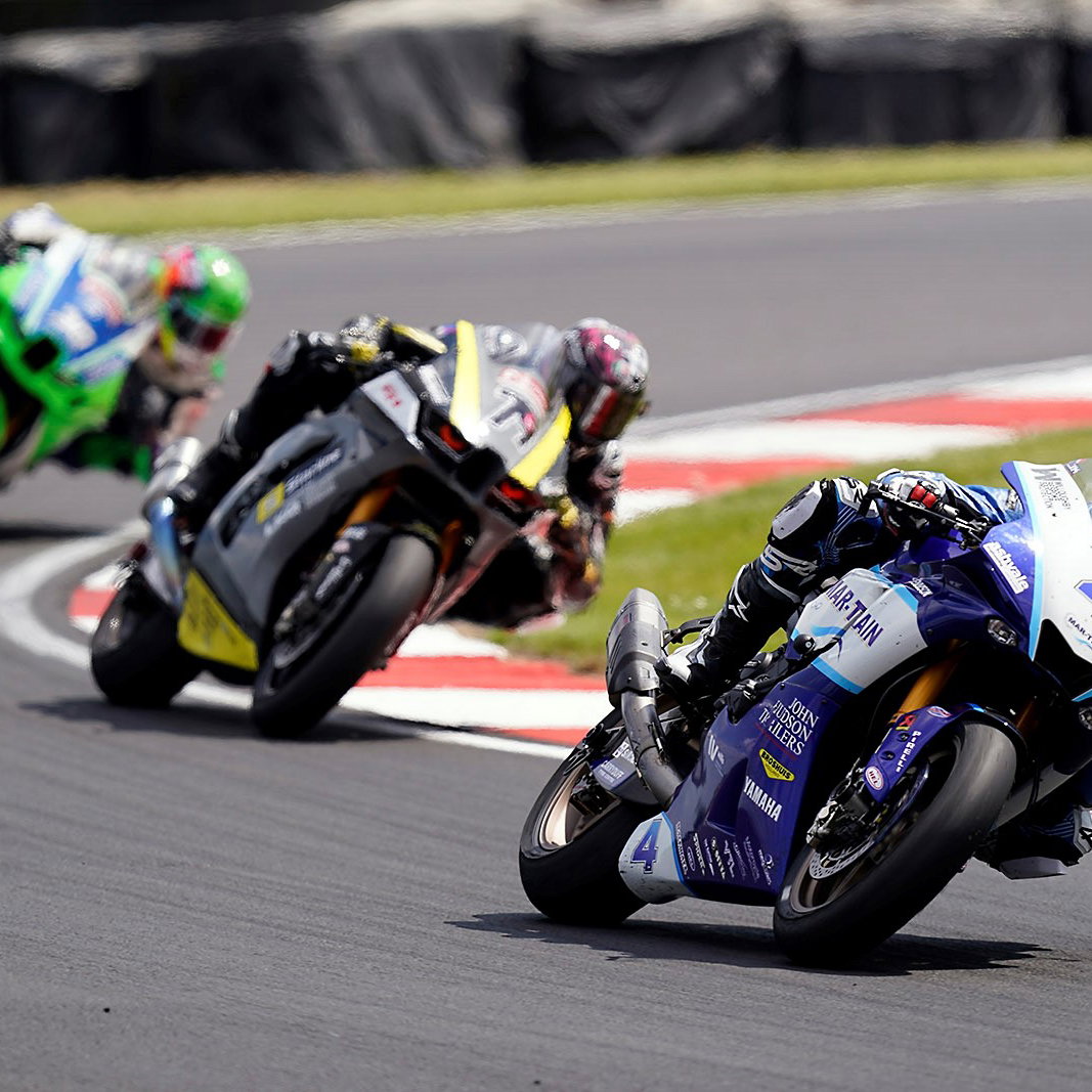 Jack Kennedy leads Storm Stacey, Max Cook, 2023 Donington Park GP BSB. - Mar-Train Racing